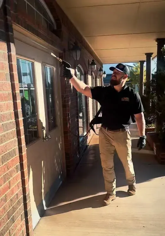 Pest control treatment in progress at an Oklahoma home